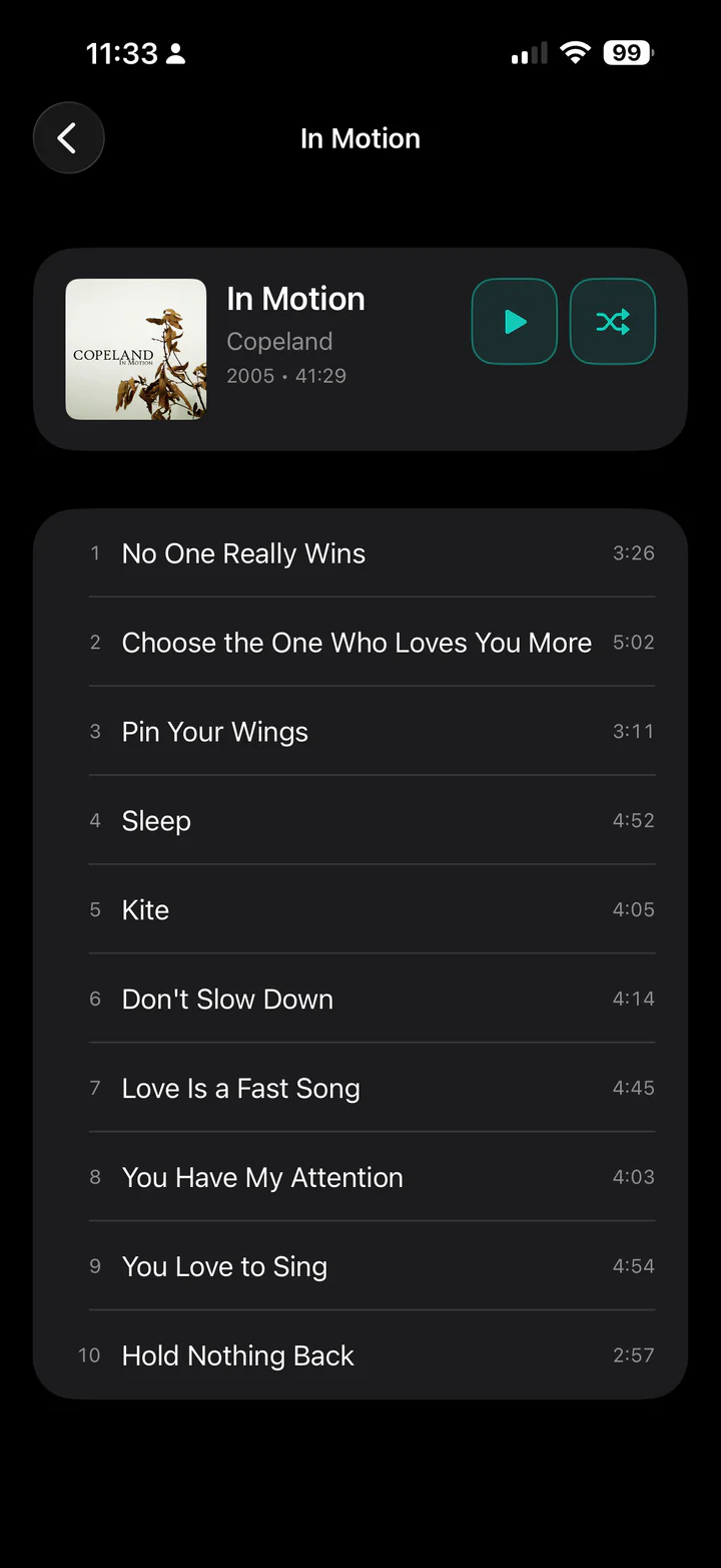Casto iOS album screen showing artwork, album details, playback actions, and the full track list